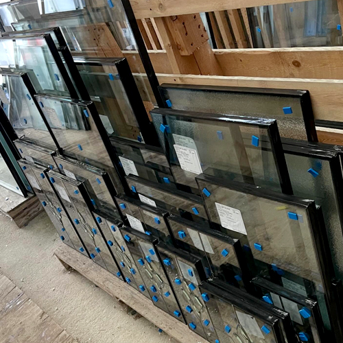 double glazed window units stacked on a pallet